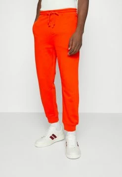 BOSS X RUSSELL ATHLETIC JAFA - Tracksuit Bottoms - Bright Orange