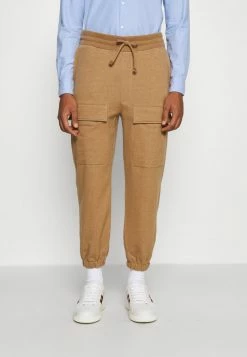 BOSS X RUSSELL ATHLETIC JAMMIN - Tracksuit Bottoms - Medium Beige