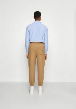 BOSS X RUSSELL ATHLETIC JAMMIN - Tracksuit Bottoms - Medium Beige -BOSS Sales Store 5a295148ebc14553b70ca76088fd2489