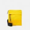 BOSS MAGNIFIED ZIP - Across Body Bag - Light/pastel Yellow