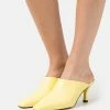 BOSS CHARLOTTE SABOT - Heeled Mules - Medium Yellow 1 BOSS CHARLOTTE SABOT - Heeled Mules - Medium Yellow -BOSS Sales Store d91fbd07d63e41b6b25ce3d6a5389825