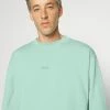 BOSS WEFADE - Sweatshirt - Light/pastel Green -BOSS Sales Store e5a13452caf84592bc5ddc04708526a0