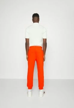 BOSS X RUSSELL ATHLETIC JAFA - Tracksuit Bottoms - Bright Orange -BOSS Sales Store f1226e1681e94b2d92ee6f43ea572c6f